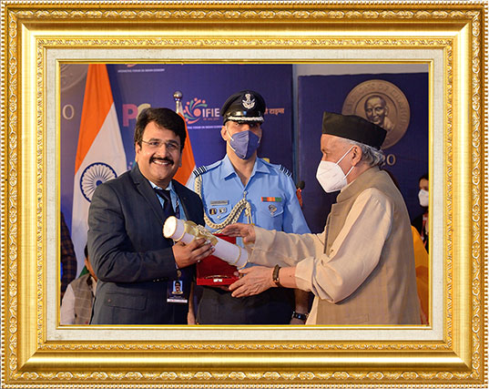 Receives the Champions of Change Award